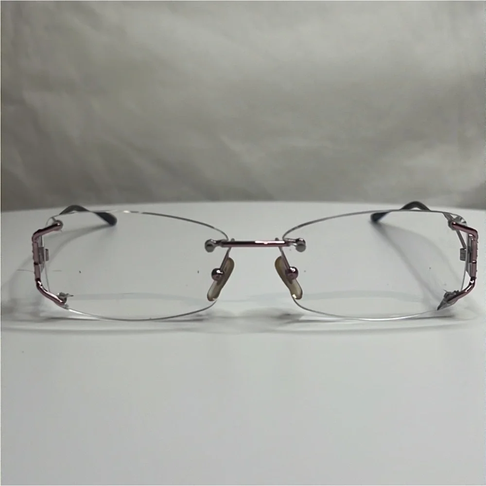 Gorgeous Authentic Versace luxury designer rimless prescription eyeglasses